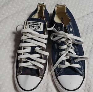 Converse Navy Blue and White Sneakers, The sneakers are a little faded.